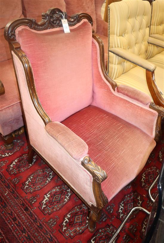 A late Victorian mahogany framed armchair